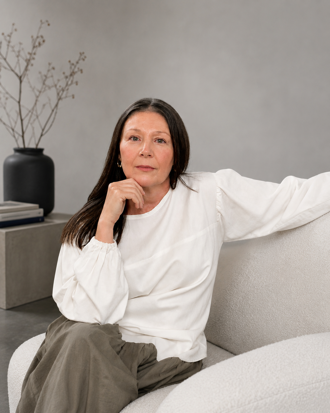 Founder of VOUS Renee Verdon sitting on a couch