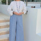 VOUS Women wearing the Mesa Top and Firmament Trousers